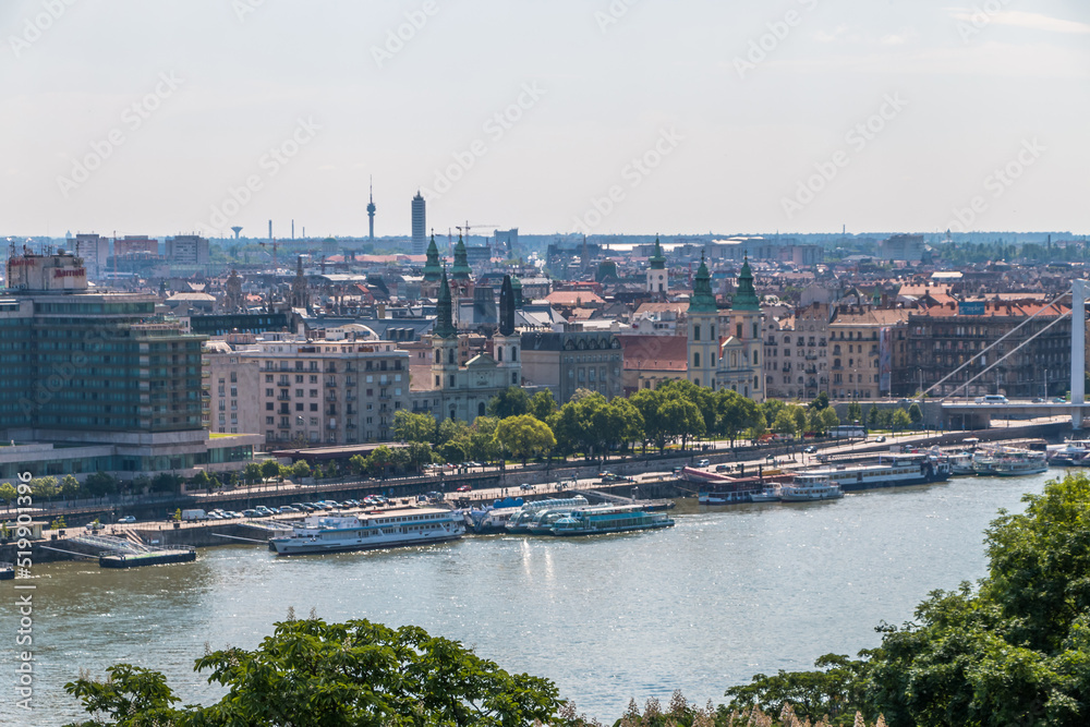 Top view of the city of Budapest in Hungary, the Danube river, bridges, the Parliament building on a warm sunny day.