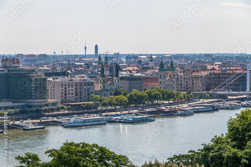 Top view of the city of Budapest in Hungary, the Danube river, bridges, the Parliament building on a warm sunny day.