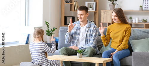 Deaf mute family using sign language at home