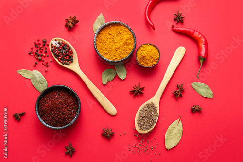 Fototapeta Naklejka Na Ścianę i Meble -  Composition with fresh spices on red background