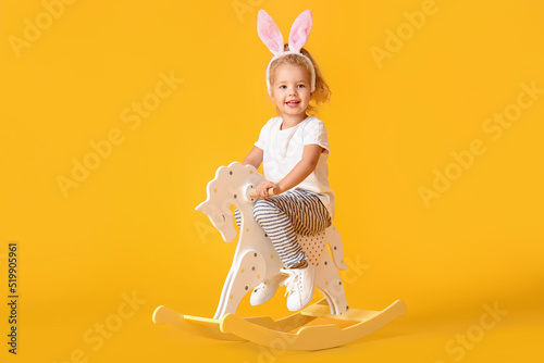 Cute little girl in bunny e...