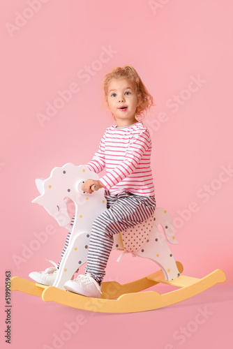 Adorable little girl in bun...