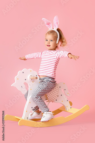 Adorable little girl in bun...