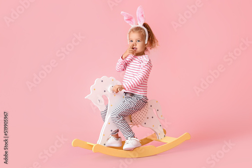 Adorable little girl in bun...