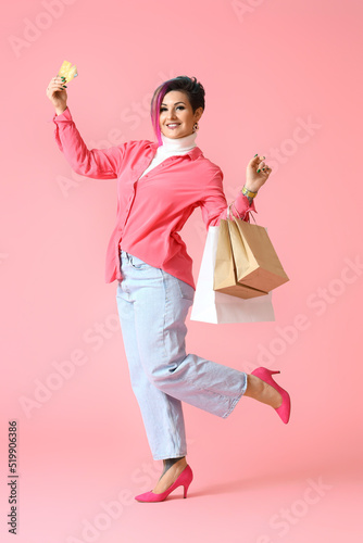 Beautiful woman with credit...