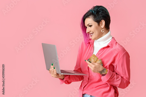 Beautiful woman with credit...