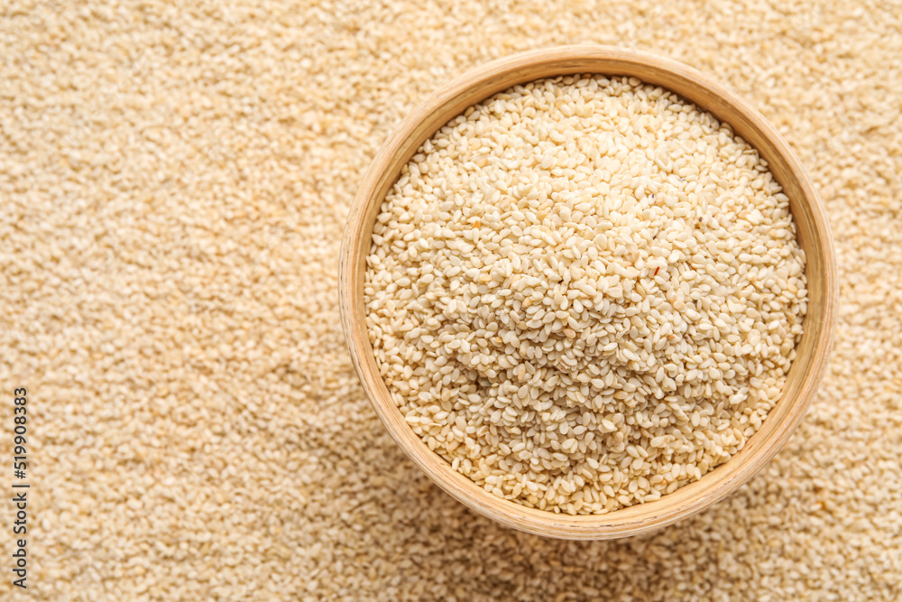 Bowl with sesame seeds as background, closeup Bowl with sesame seeds as background, closeup
