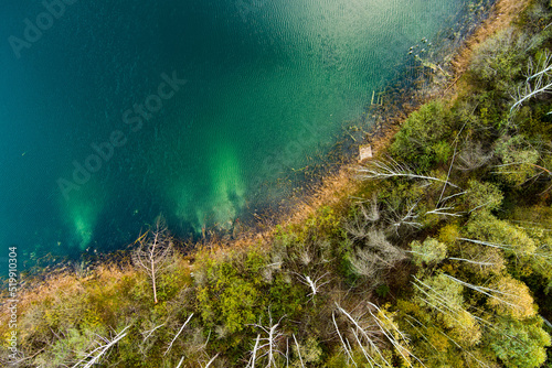 Aerial top down view of beautiful green waters of lake Gela. Clouds reflecting in Gela lake  near Vilnius city  Lithuania