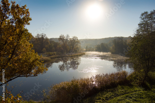 Aerial early morning view of trees and river. Fall city park scenery in Vilnius  Lithuania