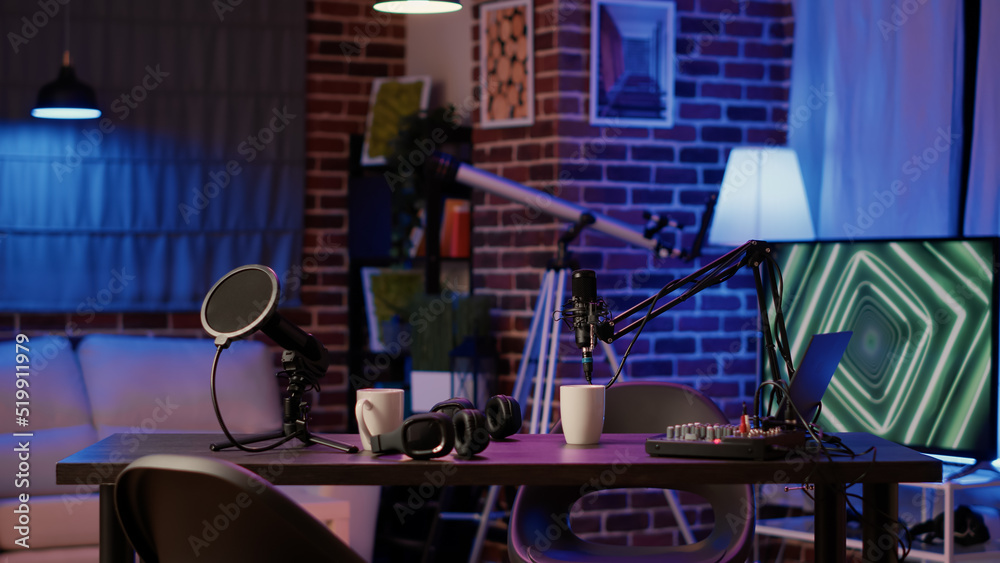 Empty vlogger desk with professional streaming equipment to broadcast live  talk show on social media. Cozy ambient room with podcast station,  microphone and headphones, sound production. Stock Photo | Adobe Stock