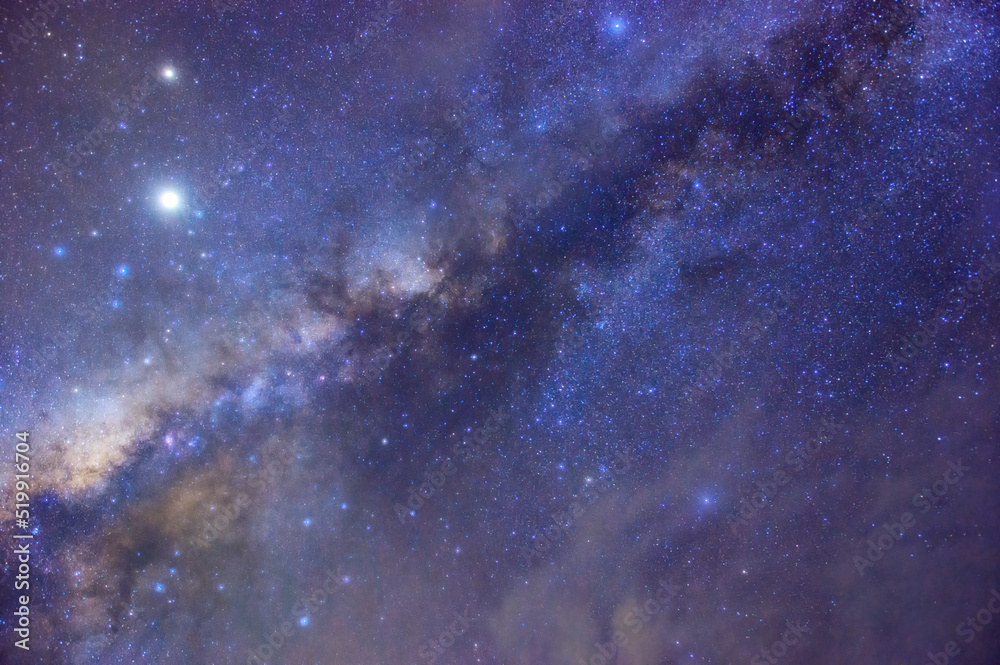 Fototapeta premium Milky way galaxy with stars and space dust in the universe, long speed exposure, Night landscape with colorful Milky Way, Starry sky at summer, Beautiful Universe, Space background.