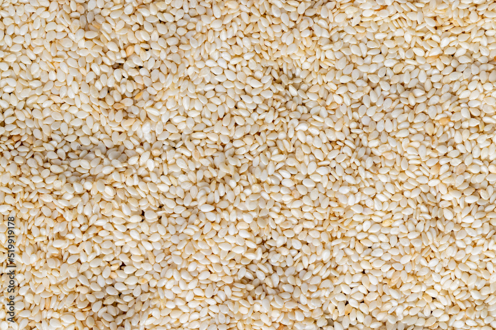 a large number of white dried sesame seeds