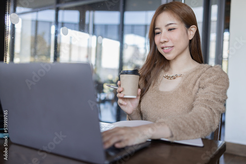 Freelancer Business asian woman or study online asian girl student having coffee and doing har work in cafe. Free Download Freelancer Business asian woman or study online asian girl student having coffee and doing har work in cafe. - GFXLoad