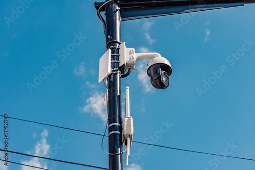 Security camera mounted on pillar to monitor traffic progress