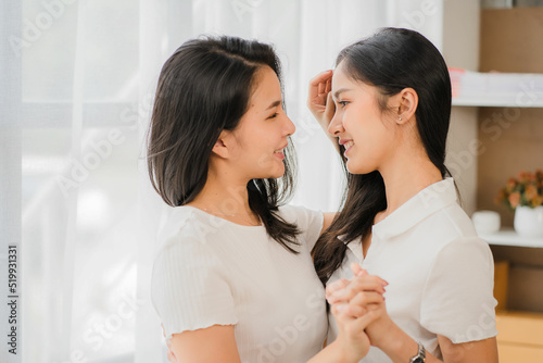 lesbian couple concept
Beautiful Asian girlLesbian couple in a room at home with a smiling face,LGBT sex concept and a happy lifestyle together. photo