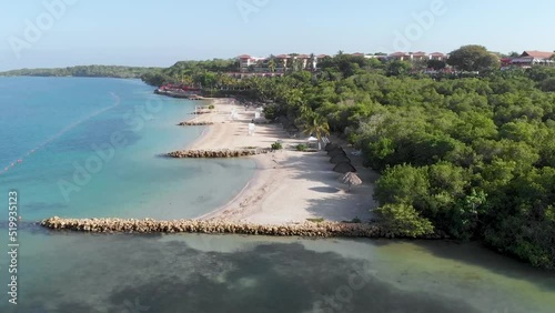 Aerial view of a paradise beach with turquoise water in Baru, Cartagena, Colombia