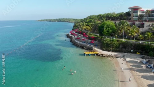 Aerial view of a paradise beach with turquoise water in Baru, Cartagena, Colombia