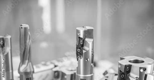 Set new drills and cutters for automatic metal processing machine, toning color