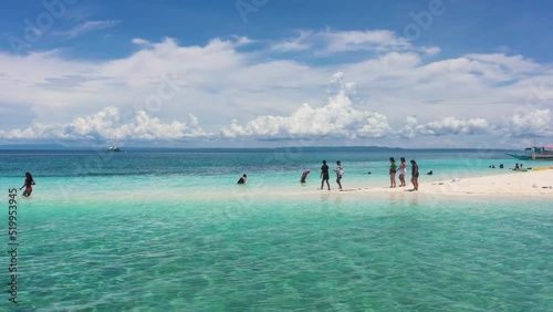 People Enjoying The Summer At Kalanggaman Island Tropical Beach In Palompon, Province Of Leyte, Philippines. Aerial Drone Shot photo