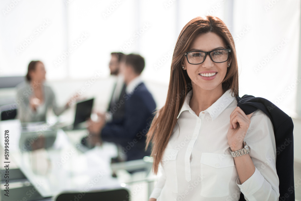 modern business woman on the background of the office modern business woman on the background of the office
