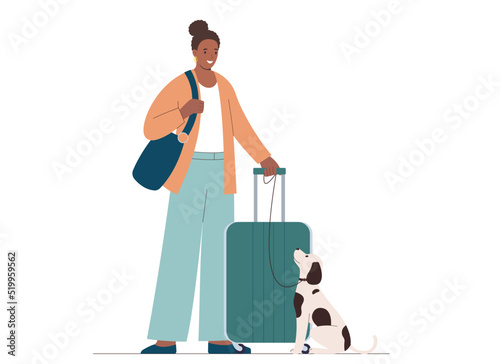 Young african american woman with suitcase, dog next to her. Concept of traveling with pets.
