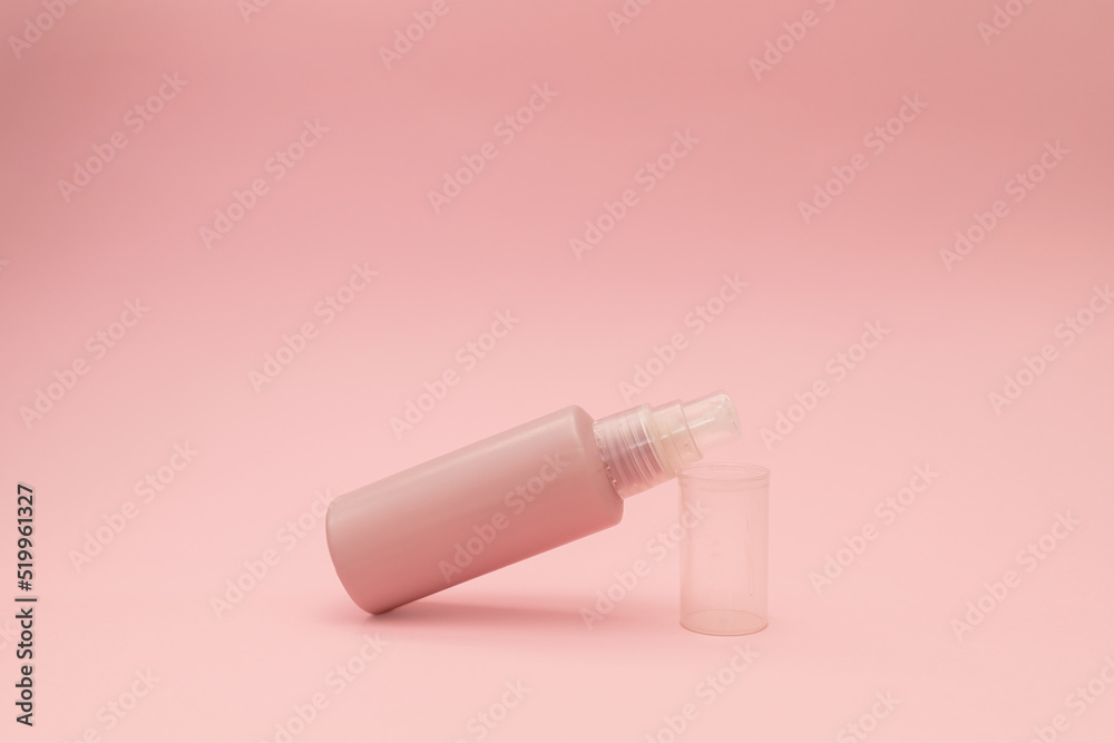Facial gel on a gently pink background, monochrome Facial gel on a gently pink background, monochrome
