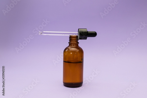 Hair serum, subject shot on purple background
