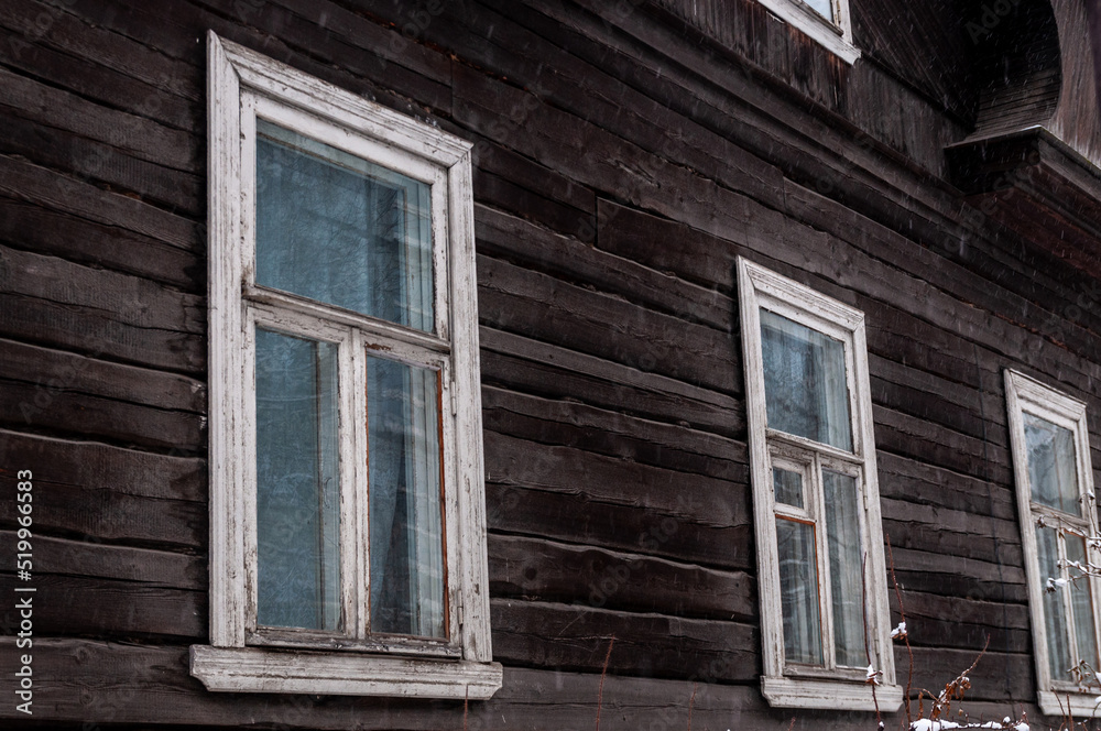 the wall of an old log house