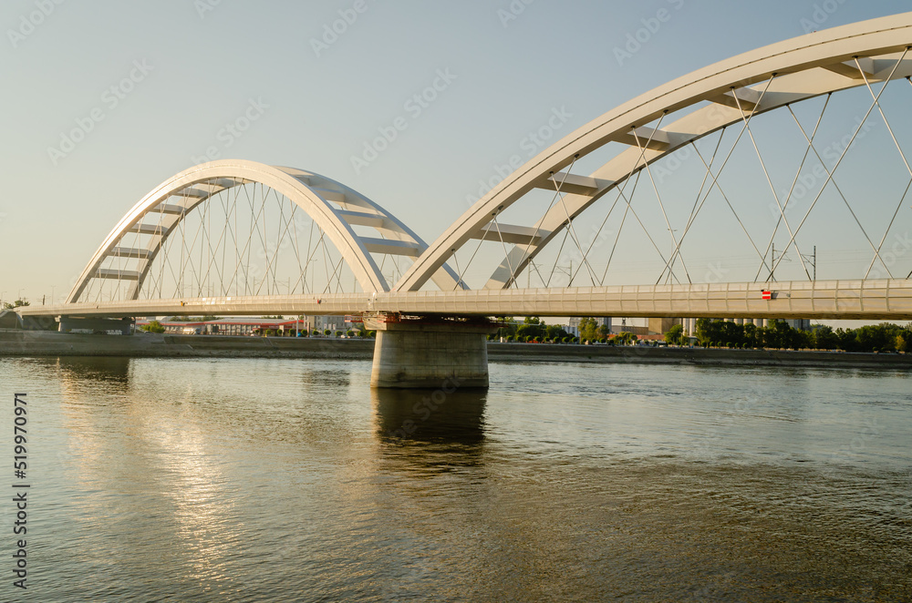 Novi Sad, Serbia. July - 25. 2022. Zezelj bridge on river Danube in Novi Sad. View of the Zezelje Bridge on the Danube in Novi Sad from the Petrovaradin side in the summer and in the afternoon.