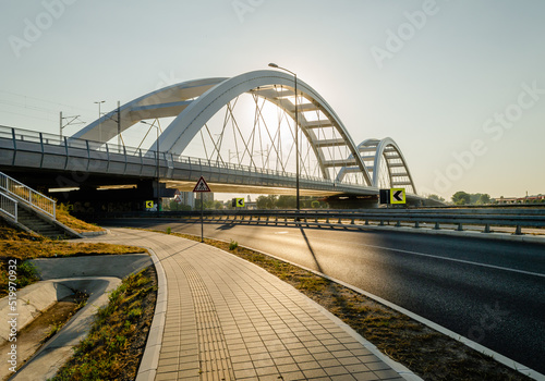 Novi Sad, Serbia. July - 25. 2022. Zezelj bridge on river Danube in Novi Sad. View of the Zezelje Bridge on the Danube in Novi Sad from the Petrovaradin side in the summer and in the afternoon.