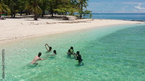 Locals And Tourists Swimming And Taking Pictures At The Beach In Kalanggaman Island, Philippines. - aerial photo