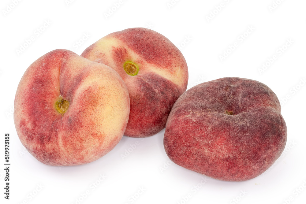 Flat peaches close-up on a white background Flat peaches close-up on a white background