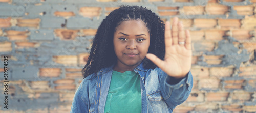 Fotografie Confident african american woman gesturing stop