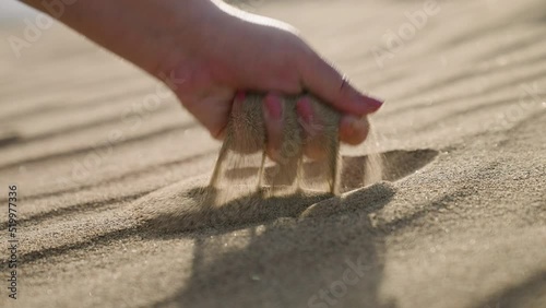 Close Up Of A Human Hand Grabbing Sand Dune In Death Valley Desert In Eastern California, USA. 