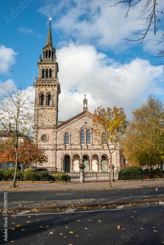Italianate building of the former Elmwood Presbyterian Church with a spire on top of a campanile, Renaissance arcade and chunky Venetian columns on University Road in Belfast, Northern Ireland, UK