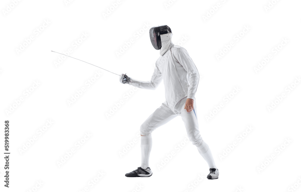 Dynamic portrait of young man, fencer in in fencing costume with sword in hand training isolated on white studio background. Sport, energy, skills Dynamic portrait of young man, fencer in in fencing costume with sword in hand training isolated on white studio background. Sport, energy, skills