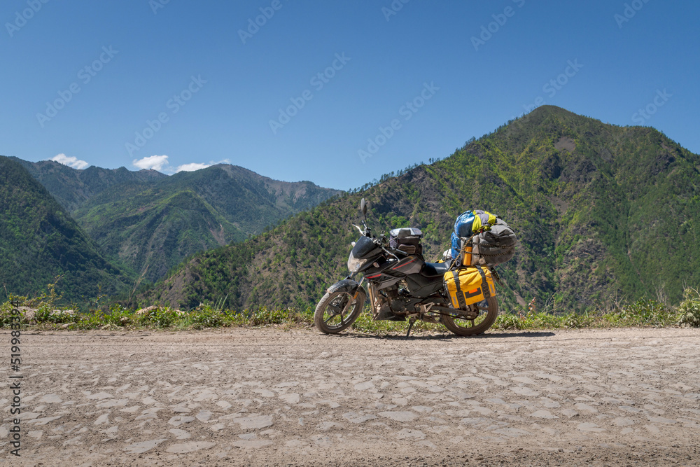 Touring Motorcycle stopped at the mountain peak
