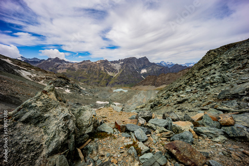 Excursion to the Gran Paradiso in the Alps. Search for rocks, minerals and precious stones. Study of the surface of rocks with sedimented debris over time. Lunar landscape, Martian landscape.