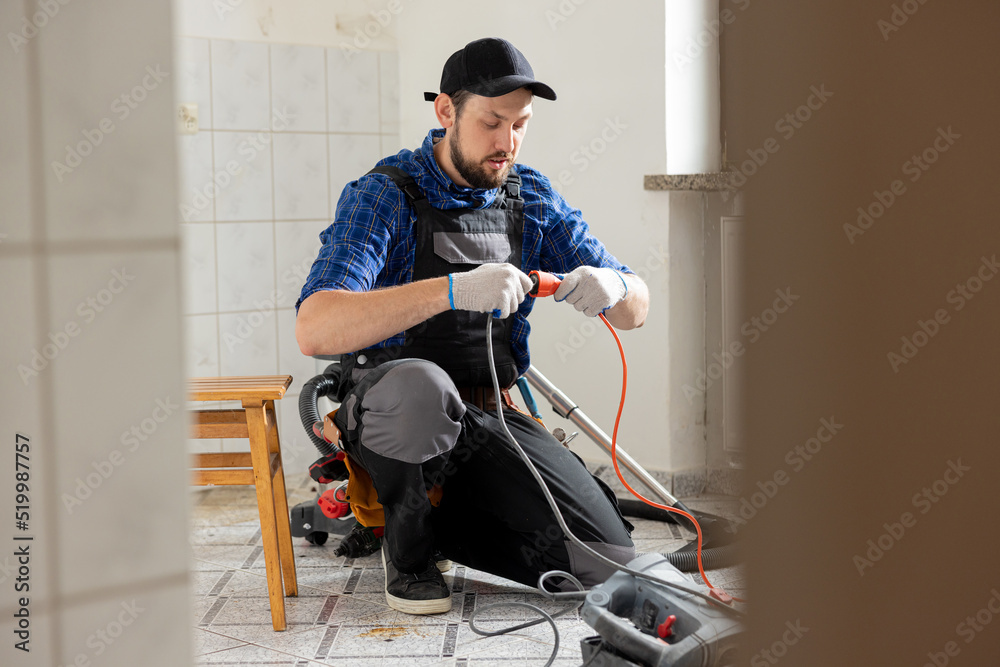 Connecting cables with a plug, extension cord plugging in construction