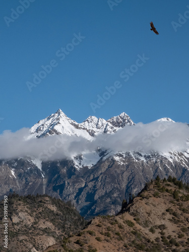 Majestic sky-high rocky snow-capped mountains