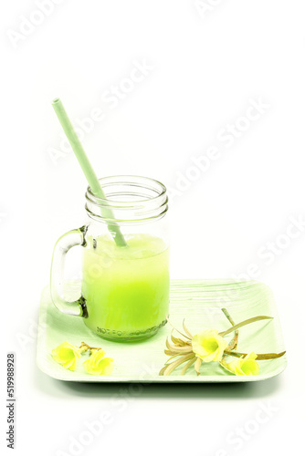 Bamboo straw in a juice glass