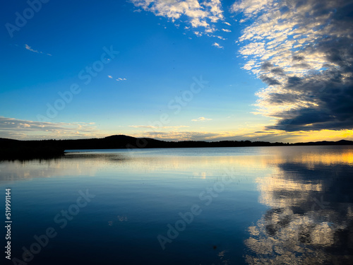 Fantastic sky reflection on the lake surface, north lake, fantastic cloudy sky, twilight 