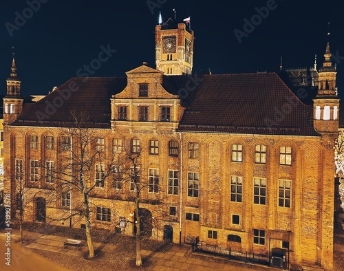 view of the old town of Toruń by night in winter