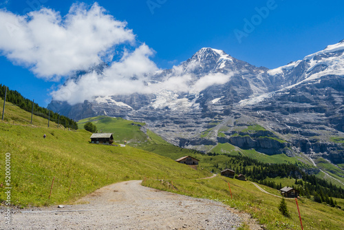 Hiking on the Eiger trail between Grindlewald and Wengen in the Swiss Alps