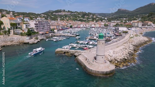 Drone shot of a lighthouse and port in Cassis, Provence, France photo