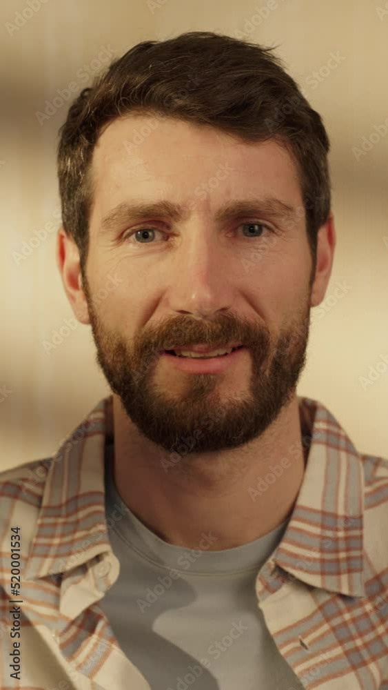 Vertical Screen: Point of View from Smartphone Camera with Handsome Man Making a Video Call from Home. Happy Project Manager Working Remotely, Talking to Colleague Online Over a Conference Software. Vertical Screen: Point of View from Smartphone Camera with Handsome Man Making a Video Call from Home. Happy Project Manager Working Remotely, Talking to Colleague Online Over a Conference Software.