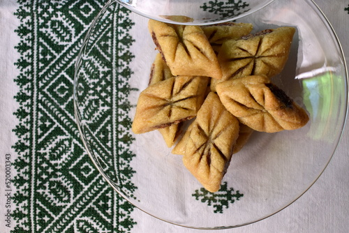 Baked Makrout. semolina, dates and honey sweets, traditional North Africa sweets photo