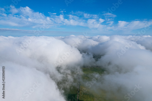 Flying over beautiful fluffy clouds