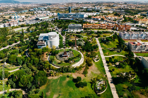 Lisbon, Portugal - July 29, 2022: Aerial drone view of Parque dos Poetas in Oerias, translated to Poet's Park