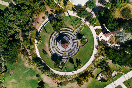 Lisbon, Portugal - July 29, 2022: Top down view of Piramide dos Poetas or Poet's pyramid in Parque dos Poetas in Oerias, translated to Poet's Park